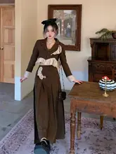 [WALKINDARK] 不規則な切り替えデザインのショートジャケットとボタン付きプリーツロングスカートのセット