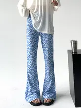 秋のデザイン感ある小さなひまわり柄のパンツ【微フレア・レディース】（セットアップ対応）