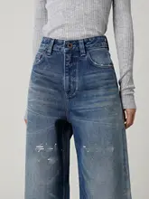 特徴的なウォッシュドワイドレッグデニムパンツ【女性用・ルーズフィット・ブラッシュ加工】