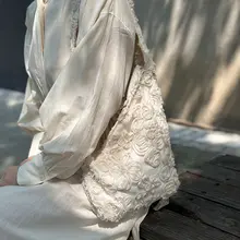 高級感ある不規則な斜め掛けバッグ【刺繍デザイン・女性用】