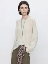春のデザイン感満載！バックリボン付きの長袖透け感トップス