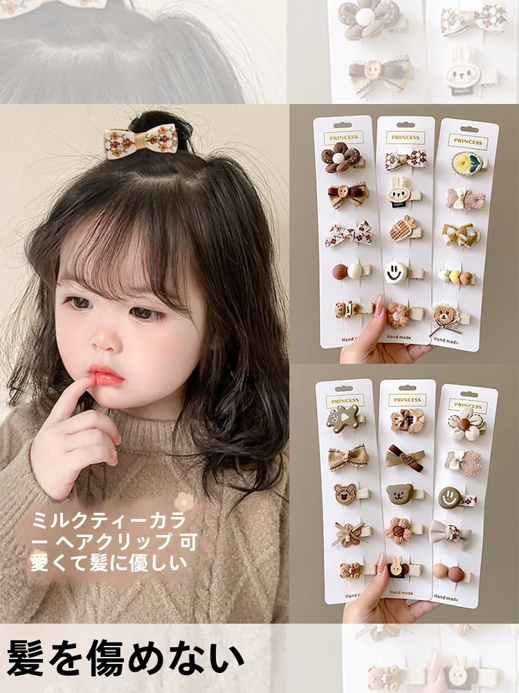 こめかみ コリコリ に効く カートゥーンデザインの茶色いヘアクリップ