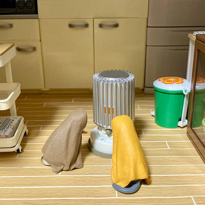 披着毛巾的猫咪フィギュア：黒白三毛猫のインテリアとしての実用性とデザイン解析