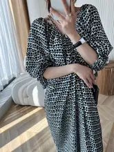 個性的なデザイン！Vネックバックオープンランタンスリーブロングドレス【した雰囲気・フラワープリント】