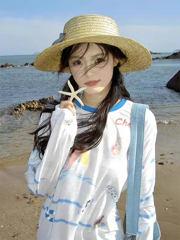 夏の日焼け防止カーディガンをどう選ぶ？通勤スタイルに合う「白地青ストライプ」の選び方を解説
