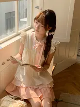 夏にぴったりな美しいフレアスリーブトップスとピンクの切り替えスカート（セットアップ対応）
