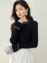 優雅なデザインのパールビーズ付きニットトップス【ラウンドネック・フレアスリーブ・ブラック】