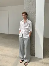 シンプルなドレープのカーブパンツ【男女兼用・カジュアル・ルーズフィット】（セットアップ対応）