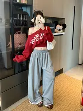 デザイン性あり！アシンメトリー肩のルーズフィット長袖トレーナー【プリント・カジュアル】