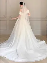 一字肩デザインの上品なウェディングドレス【トレイン付き・新郎迎え用】