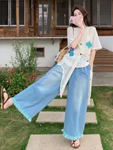 白色レース短袖重ね着ベストとデニムワイドパンツの夏の女性向けコーディネート（セットアップ対応）
