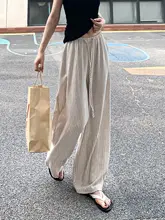 ストライプデザインのリネン混広がりパンツ【レディース・夏用・ハイウエスト・フィット】（セットアップ対応）