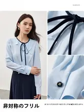 フリルヘムデザインのリボン付きラウンドネックシャツ【ブルー・流れるようなシルエット・ゆったりシフォン】