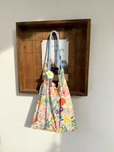 海辺のリゾートスタイル 小花柄巾着キャンバスバッグ【大容量・薄型トートバッグ・カジュアル】（セットアップ対応）