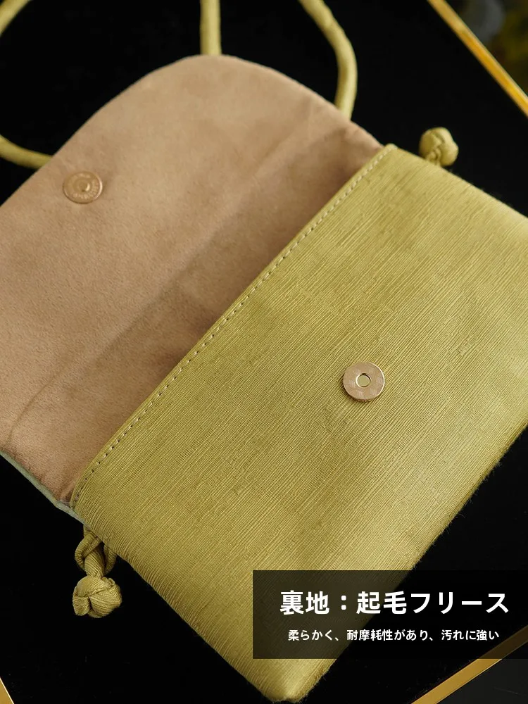 通勤の定番スマートフォンポーチに何が欠けているの？新中式の美しさが解決する手提げバッグとは
