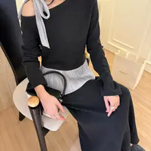 デザイン性のあるバイカラーのリボン付きトップスと優雅なフレンチスタイルのスカート（セットアップ対応）