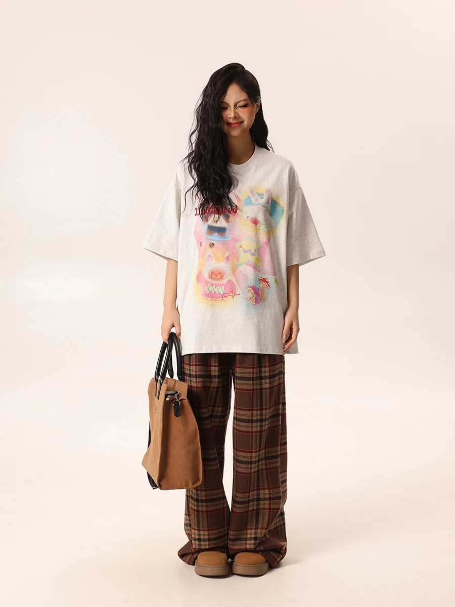 カジュアルなアメリカンカートゥーンプリント半袖Tシャツ：街头風のキャラクターが特徴的な日常着