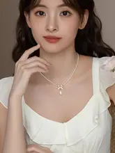 二重リボン風 パール調ペンダントネックレス【女性用・デコレーション・クラス感のあるスタイル】