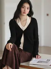 大きいサイズのバイカラー風ニットトップス【ノースリーブ・ハイネック・秋用】（セットアップ対応）