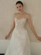 リボン付きビスチェレースの軽やかな婚礼ドレス【ウェディング・フレンチスタイル・プリンセスライン】（セットアップ対応）