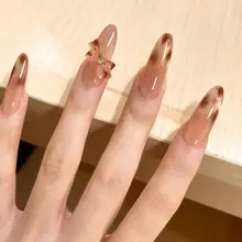 秋冬新作！ヒョウ柄猫目デザインのハンドメイドネイル【フレンチリボン・ショートタイプ】