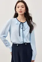 フリルヘムデザインのリボン付きラウンドネックシャツ【ブルー・流れるようなシルエット・ゆったりシフォン】