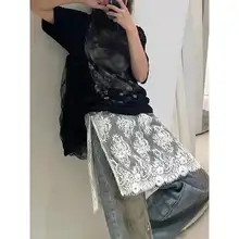 白色のネットレースのフレアスカート【春秋用・透け感・リボン付き】