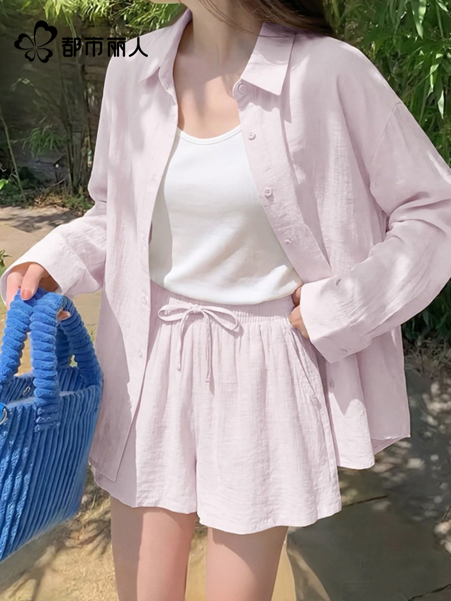 6月後半に着る女性用シャツ：都市丽人 ミューンナイトブルー セットアップ対応の軽やかなデザイン