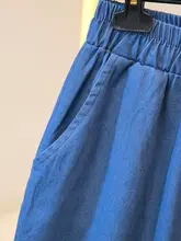 春の新作！ヒラヒラのフリル付きデニムパンツ【ウエストゴム・ゆったりシルエット・九分丈・ボトムス】