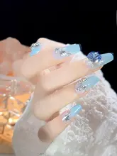 立体リボンデザインの金属製ネイル装飾品【シルバー・ストーン付き】