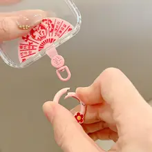 中国風ファン型スマホストラップクリップ【回転式・固定用パッド付き・充電に影響なし】