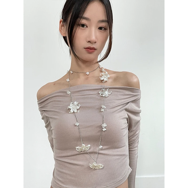ロマンティックフラワーパールウエストチェーン：女性向けリゾートスタイルとフランス風コーデに最適な百搭腰链