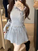 グレーの風信子 プリーツスカートとニットトップス【ピーターパンカラー・リボン付き・ウエスト収縮】（セットアップ対応）
