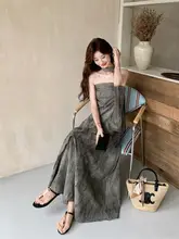 高級感溢れる不規則デザインのストラップレストップスとタイダイ柄のスカート（セットアップ対応）