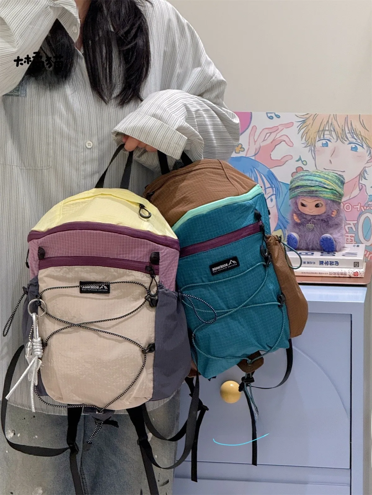 オレンジ猫デザインのアウトドア用小型リュックサック：軽量・防水・通勤・登山に最適な機能解説