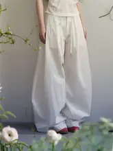 白色天竺ニットの結び付きノースリーブトップス【コットンリネン・ワイドパンツ・夏用】（セットアップ対応）