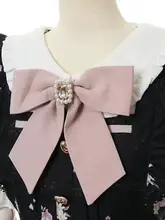 リボンデザインのブローチ【水晶飾り・ピンク・ファッションアクセサリー】