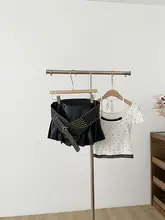 美式ストリートスタイルのスタッズ付きレザースカート【Aライン・ウエスト低め・ひざ上丈】