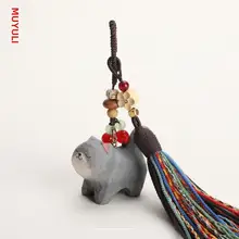 手作り木彫りの小さな青い猫のキーホルダー【バッグやリュックに最適】