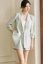 春の通勤に最適！浅緑色のジャケットとパンツのツーピーススーツ（セットアップ対応）