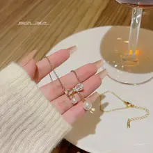 バロックパールネックレス【リボンデザイン・チタン鋼・カラー落ちない】