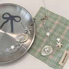 海辺の星と貝殻のブルーガラス五角星付きスマホチェーン【リボンデザイン】