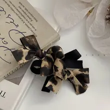 FUNCOCO リボン付き豹柄ヘアクリップ【スプリングクリップ・ポニーテール用】