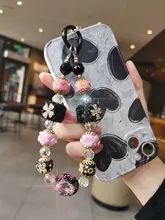 豪華な水晶ディテールの幸運花モチーフのカメラストラップ【手作り・ビーズチェーン・デザイン性高い】