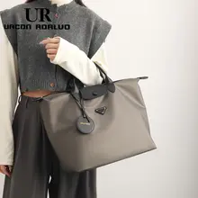 大容量のトラベルバッグ【牛津布・女性用・ハンドル付き・出張用】