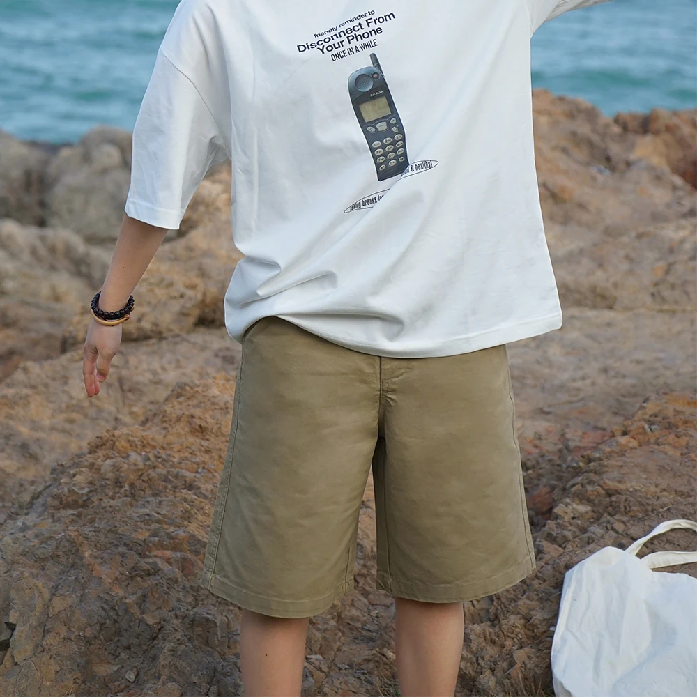 半ズボン メンズ ダサい でもいいな？その答えは、カジュアルなカキ色ハーフパンツにあり