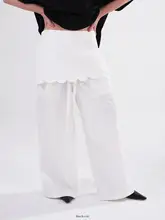 波浪縁デザインの翻蓋カジュアルパンツ