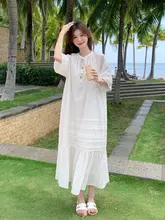 女性の夏用オフホワイトのルーズレースアップドレス