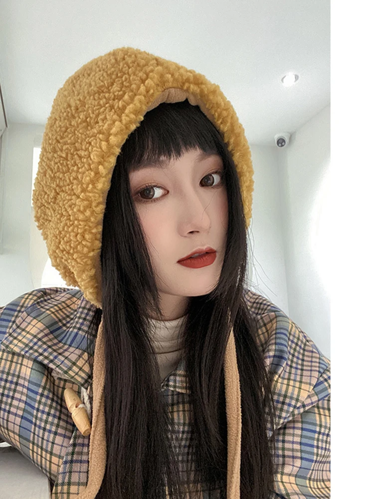 保温性と可愛さを  兼ね備えたもこもこ冬帽子：耳あて付きひも付きタイプの実用性と性能解析