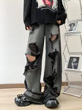 ストリートスタイルデザインのアシンメトリー破れデニムパンツ【ゆったりシルエット・夏用・ウォッシュ加工】